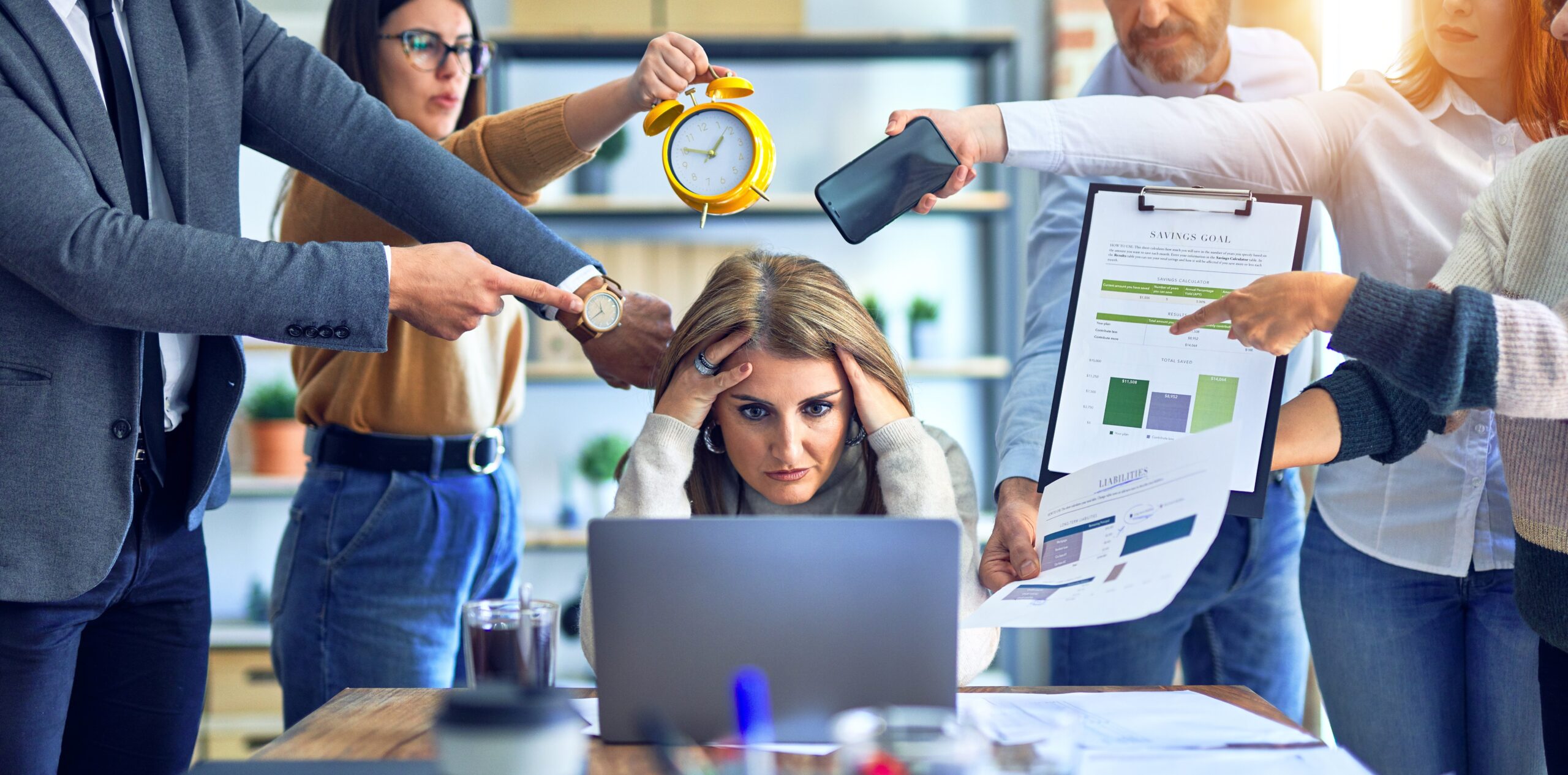 Group of business workers working together. Partners stressing one of them at the office